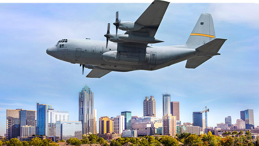 Aventure Aviation | C-130 flying over Atlanta
