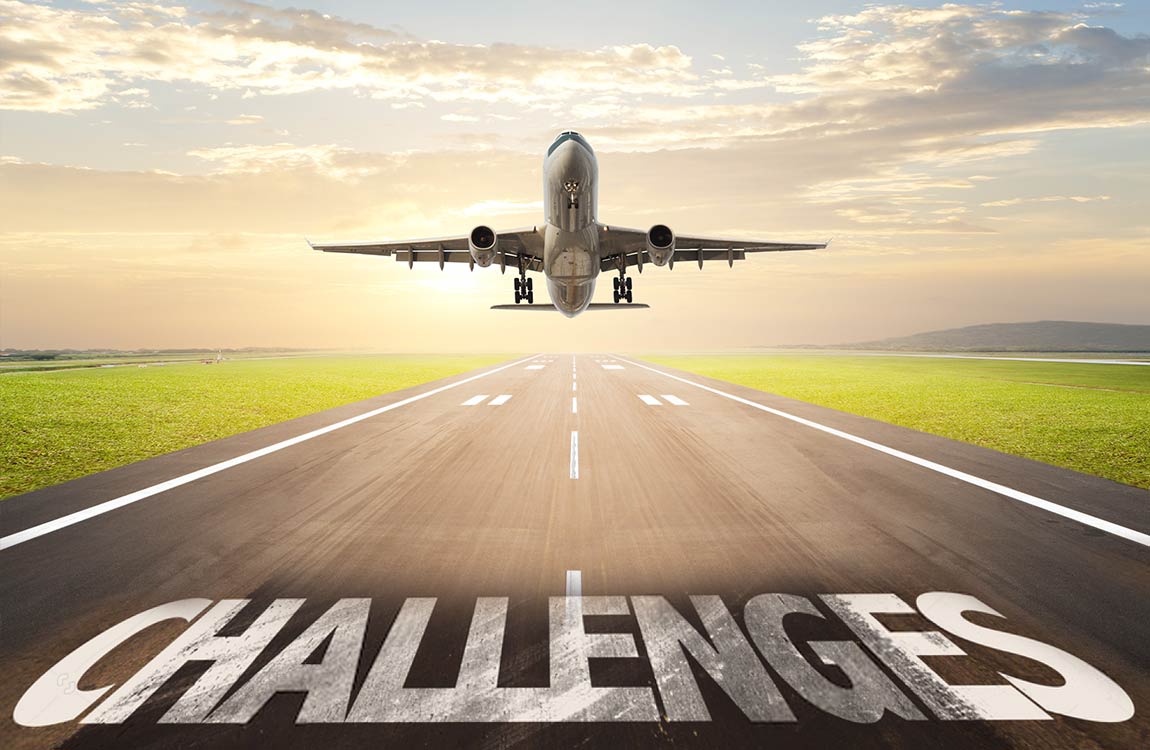 AIrplane taking off over runway, which contains the word "Challenges"