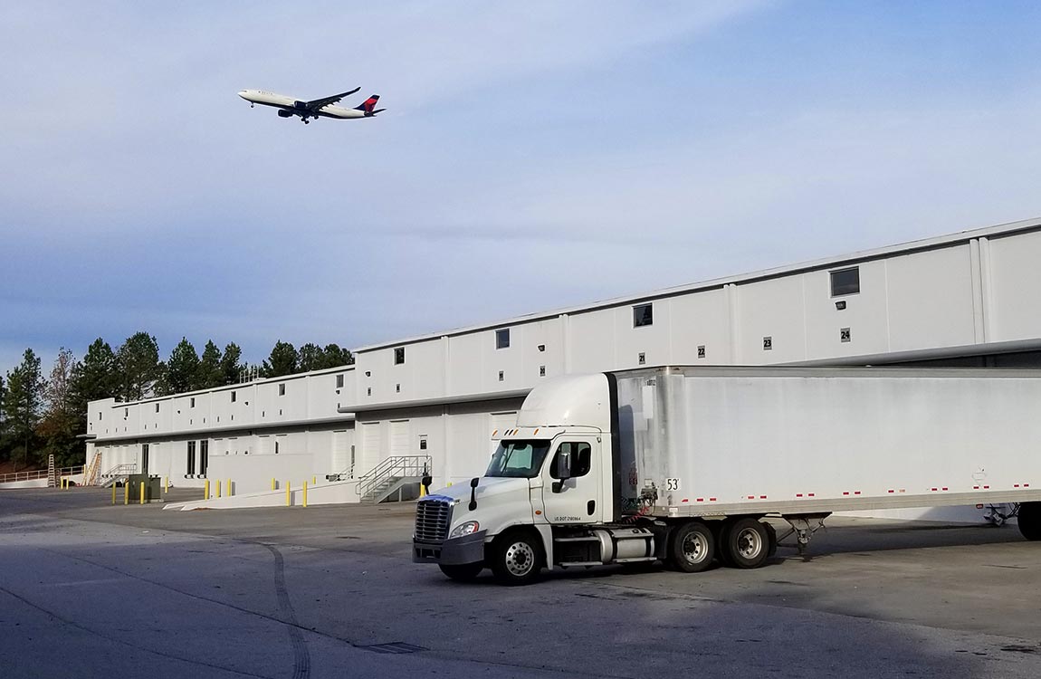 The ourdoor loading dock section of Aventure Aviation's new warehouse space