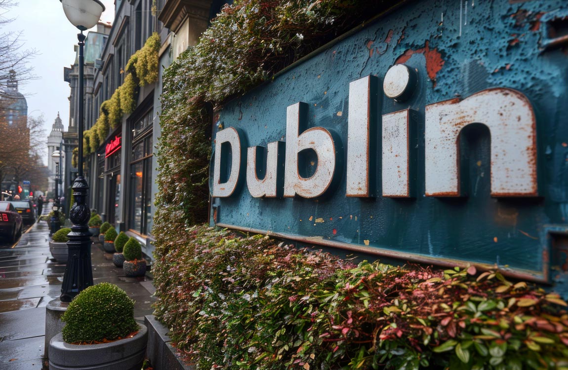Dublin street with a close up of a large sign saying "Dublin" 