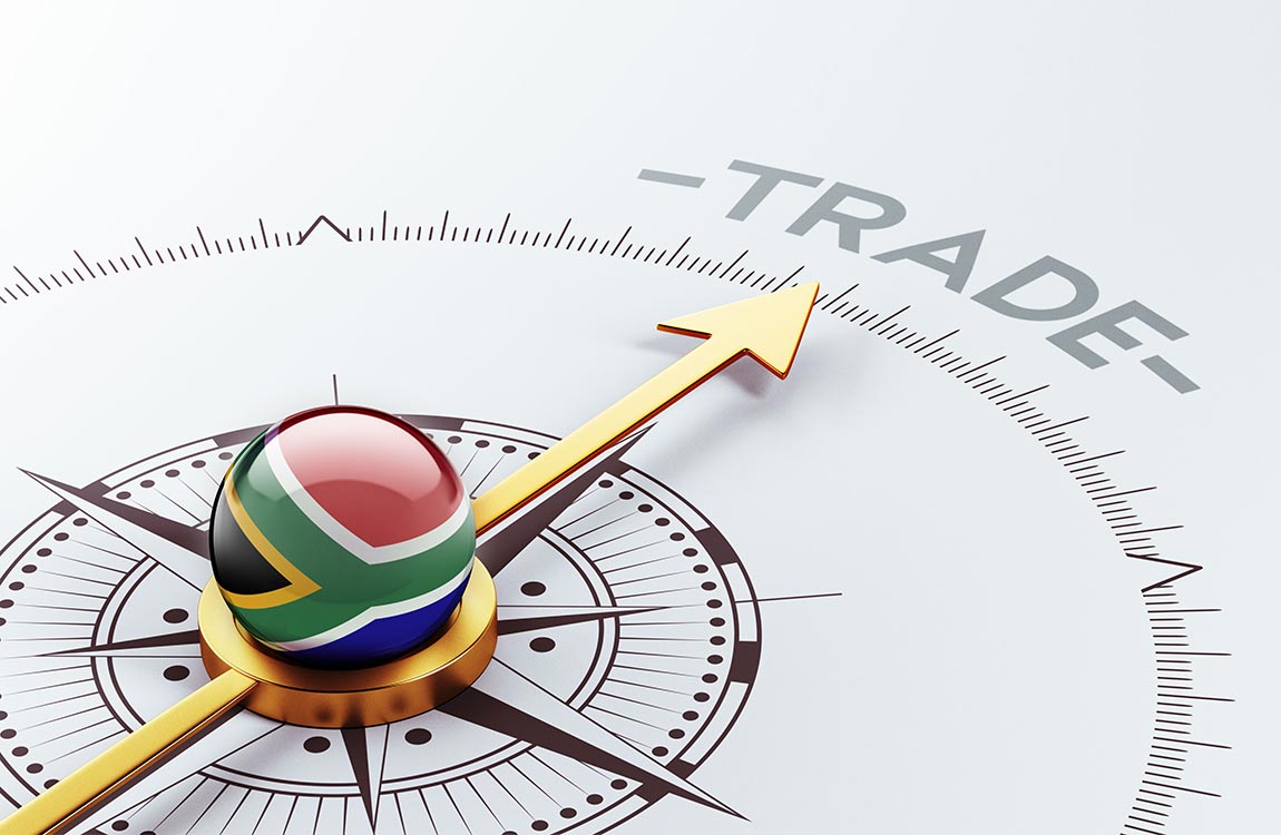 A compass wth the South African flag points to text saying "Trade" 